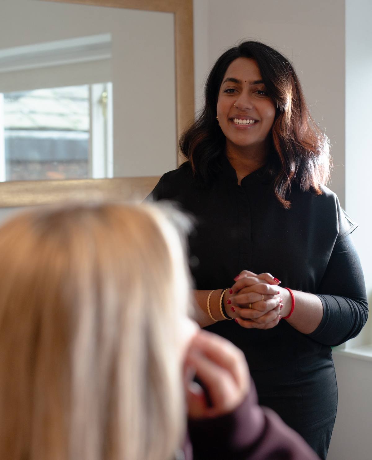 Dr Misha in consultation with a client at Revitalise Aesthetics Liverpool Dr Misha in consultation with a client at Revitalise Aesthetics Liverpool